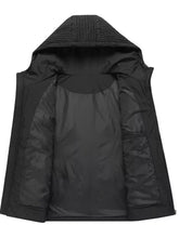Men’s plus size black hooded puffer jacket with quilted vest, textured knit hood, and smooth inner lining