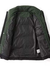 Men’s plus size dark green textured puffer jacket with black interior lining zipper details and long sleeve length outer shell