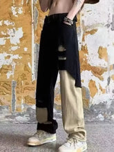 Men’s plus size wide-leg jeans in black and beige two-tone distressed denim with a high-waisted ripped design