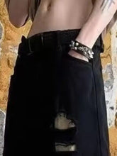 Men’s plus size black distressed wide-leg jeans with ripped knee and black belt with textured buckle