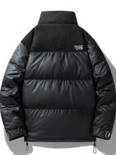 Black men’s plus size urban style padded coat with quilted panels and high collar shown from the back