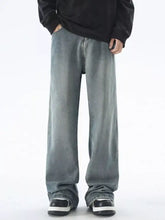 Men’s plus size vintage wash wide leg jeans in faded gray denim with a relaxed straight-cut silhouette