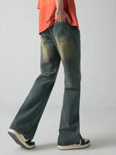 Mens plus size vintage wash wide leg jeans in dark wash denim with faded distressed detailing on back pockets and thighs