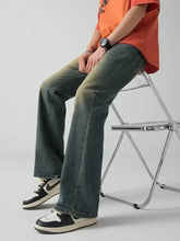Men’s plus size vintage wash wide leg jeans in dark green slightly faded denim with a flared leg cut
