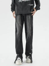 Men’s plus size black denim washed flare jeans with distressed details and zipper accents along the legs
