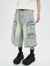Men’s plus size washed light-wash denim cargo capris jeans with multiple flap pockets and a relaxed wide-leg cut