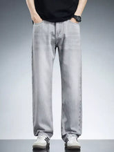 Men’s plus size light-wash denim wide leg jeans with relaxed straight-leg cut and classic stitching details