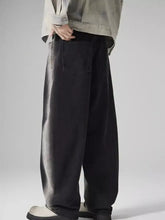 Men’s plus size washed wide leg jeans in black denim with a faded distressed finish