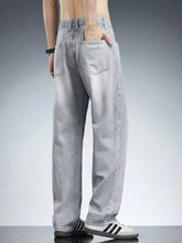 Men’s plus size light gray washed wide leg jeans with elastic waistband and relaxed fit denim material
