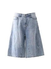 Men’s plus size wide leg capris jeans in light-wash denim with high-rise waist and wide straight-leg cut