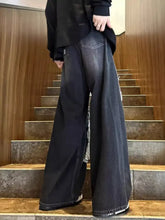 Men’s plus size wide leg dark-wash denim jeans with distressed fading and raw hem detailing