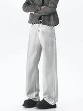Men’s plus size wide leg high waisted jeans in light wash denim with relaxed fit and visible stitching details