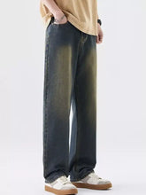 Men’s plus size wide leg jeans in dark-wash denim with a faded gradient effect transitioning to olive green at bottom