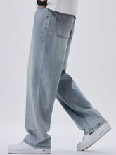 Men’s plus size wide leg jeans in light-wash denim with relaxed straight-leg cut and classic stitching details