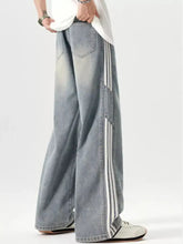 Men’s plus size light-wash denim wide leg jeans with three vertical white side stripes on the outer leg