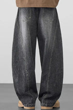 Men’s plus size wide leg wash jeans in dark gray denim with faded wash and visible stitching details