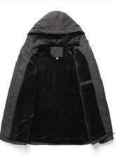 Men’s plus size winter warm hooded parka jacket with black quilted exterior and plush velvet lining