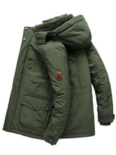 Men’s plus size olive green quilted winter hooded parka jacket with fur-lined hood and red leather sleeve patch
