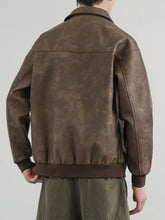 Men’s plus size brown distressed faux leather shacket with ribbed cuffs, subtle mottled texture, normal thickness sleeve length