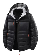 Men’s plus size zip up hooded contrast puffer jacket in black with gray-lined hood and orange zipper pulls