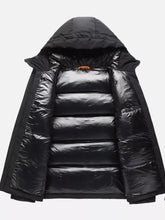 Men’s plus size zip hooded puffer jacket in black with shiny quilted exterior and orange zipper pull