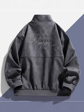 Back view of black faux leather mens plus size zip up long sleeve bomber jacket with silver embroidered the formines company script