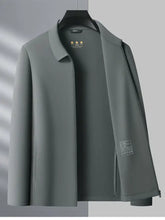 Men’s plus size zip up long sleeve jacket in sleek dark gray with modern design and subtle stitching details