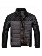 Mens plus size zip up puffer jacket in black quilted design with dark gray lower section and plaid lining