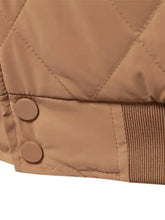 Beige men’s quilted snap long sleeve jacket with matching buttons and ribbed fabric trim for casual wear