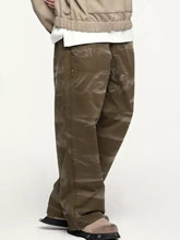 Men’s relaxed fit cargo jeans in olive green matte finish with reinforced stitching and multiple pockets