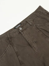 Dark olive green men’s relaxed fit jeans made of denim with subtle faded texture and reinforced stitching