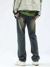 Men’s relaxed fit dark-wash denim jeans with a faded distressed look and frayed hem relaxed fit jeans
