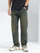 Men’s relaxed fit jeans in dark-wash denim with a relaxed straight-leg cut and subtle fading along the thighs