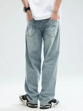 Men’s relaxed fit jeans back side in light-wash denim with white wavy stitch detail and comfortable fabric blend