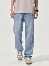 Men’s light-wash denim jeans with a relaxed fit straight leg cut for comfortable casual wear