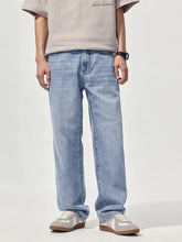 Men’s light-wash denim jeans with a relaxed fit straight leg and classic five-pocket design for casual wear