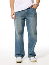 Men’s relaxed fit wash jeans in light-wash blue denim with a straight-leg cut and classic five-pocket design
