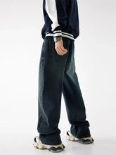 Men’s relaxed fit washed dark-wash denim jeans with a wide-leg cut and visible stitching details