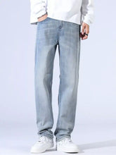 Men’s relaxed fit wide leg light-wash denim jeans with straight-leg cut and classic stitching