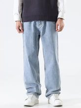 Men’s light-wash denim wide leg jeans with a relaxed fit and straight-leg design for casual wear