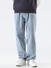 Men’s light-wash denim relaxed fit wide leg jeans with a straight cut for comfortable casual wear