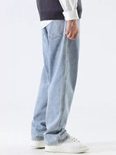 Men’s light-wash denim wide leg jeans with relaxed fit straight-leg cut and classic stitching details