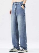 Men’s relaxed fit wide leg vintage wash jeans in light-wash denim with five-pocket design and wide-leg cut