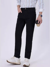 Men’s slim fit jeans in black slim-fit denim with a classic five-pocket design and subtle stitching details