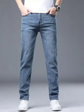Men’s slim fit jeans in light-wash blue denim with a straight-leg cut and classic five-pocket design