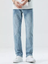 Men’s slim fit light-wash denim jeans with straight-leg cut and subtle fading in durable cotton material