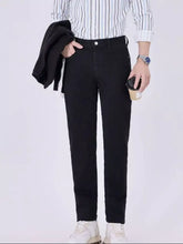 Black slim fit denim jeans with classic five-pocket design and button closure for men slim fit jeans