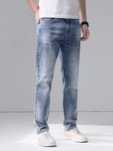 Men’s slim fit jeans in light-wash denim with subtle fading for a casual modern look and slim fit cut