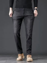 Men’s slim fit wash jeans in black denim with subtle fading and a tailored slim fit design