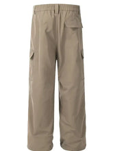 Mens straight cargo pants in khaki green with elastic waist and multi pockets